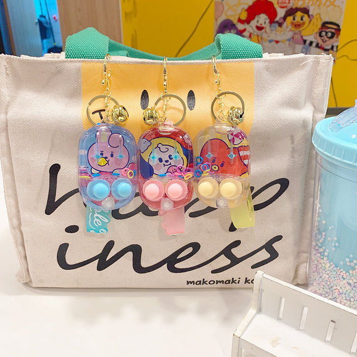 Wholesale water ring game machine key chain hanging decoration decompression toy gift keychain small pendant doll