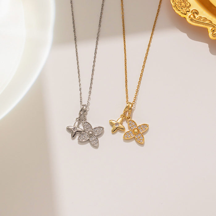 Wholesale Design a new double four leaf flower necklace for women, with a luxurious, sweet, trendy, and cool feel that won't fade. Clavicular chain