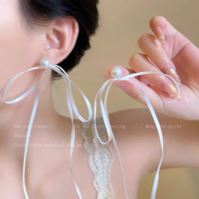 Wholesale Pearl ribbon earrings, bow earrings, niche, unique and sweet earrings