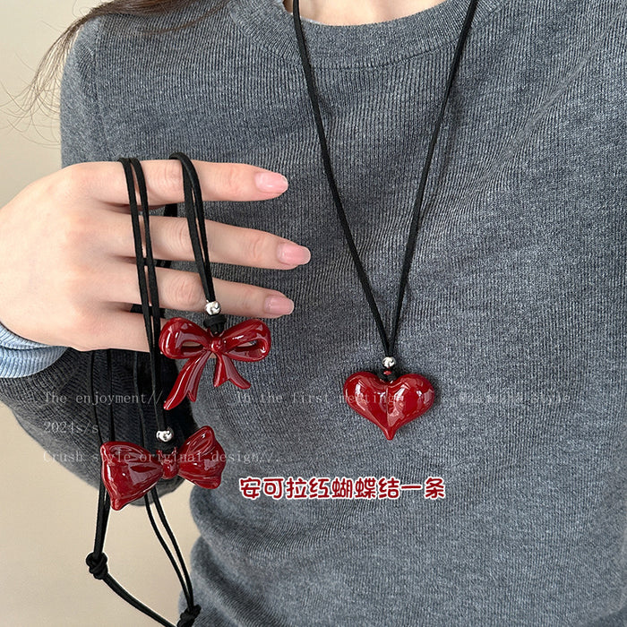 Wholesale Bow necklace, new minimalist style sweatshirt chain, niche and versatile black leather rope accessory