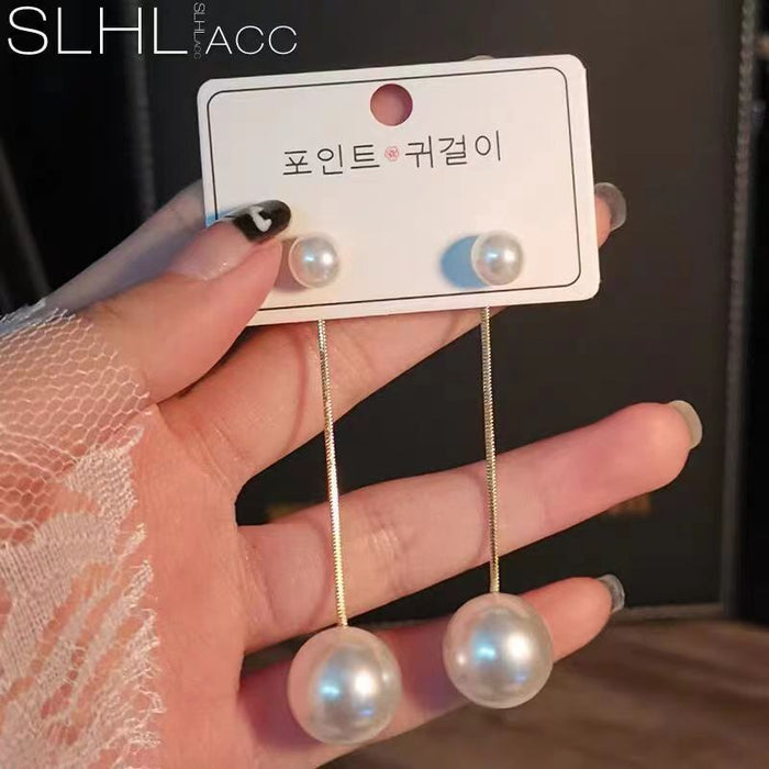 Wholesale Imitation pearl earrings for women tassel earrings long face slimming earrings
