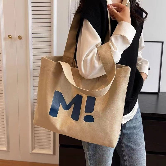 Wholesale Versatile class canvas bag, simple and casual commuting tote bag, large capacity single shoulder bag