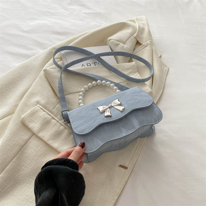 Wholesale Fashionable pearl handbag, crossbody, stylish design, butterfly texture small square bag