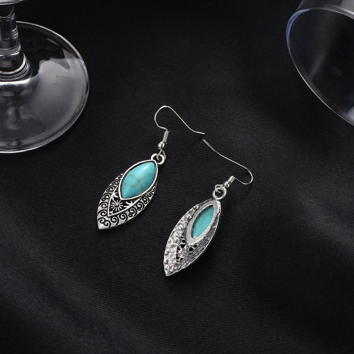Wholesale Vintage turquoise oval carved openwork earrings