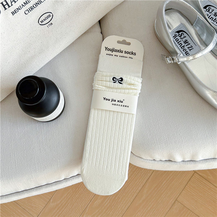 Wholesale Butterfly knot embroidered socks, solid color boneless pile socks, white socks