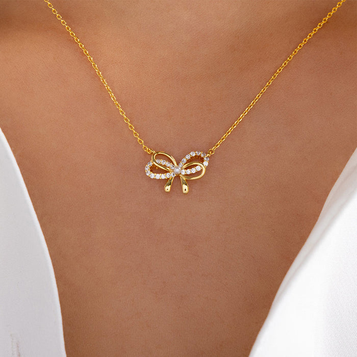 Wholesale Personalized design of jewelry, alloy bow pendant, versatile, simple, diamond studded bow necklace