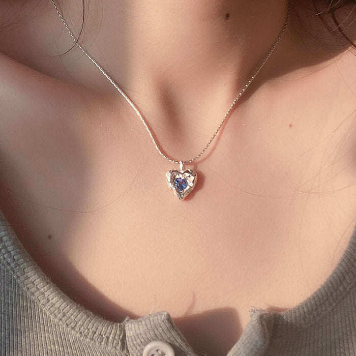 Wholesale Irregular hammer patterned heart-shaped necklace with niche design, blue zircon peach heart collarbone chain