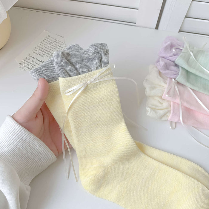 Wholesale Colorful bow tie pile socks, cute and versatile socks