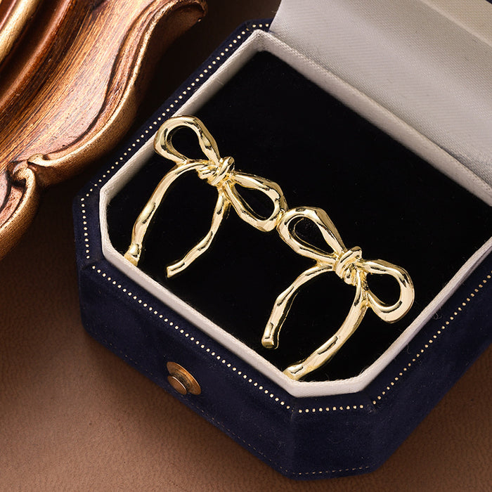 Wholesale Butterfly knot earrings, simple and fashionable, smooth and elegant earrings