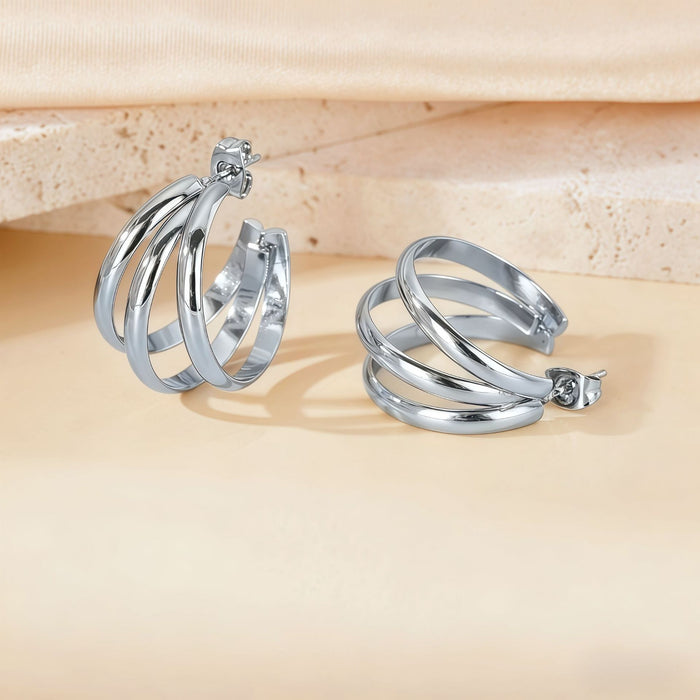 Wholesale Geometric Titanium Steel Three-Line Dense Earrings