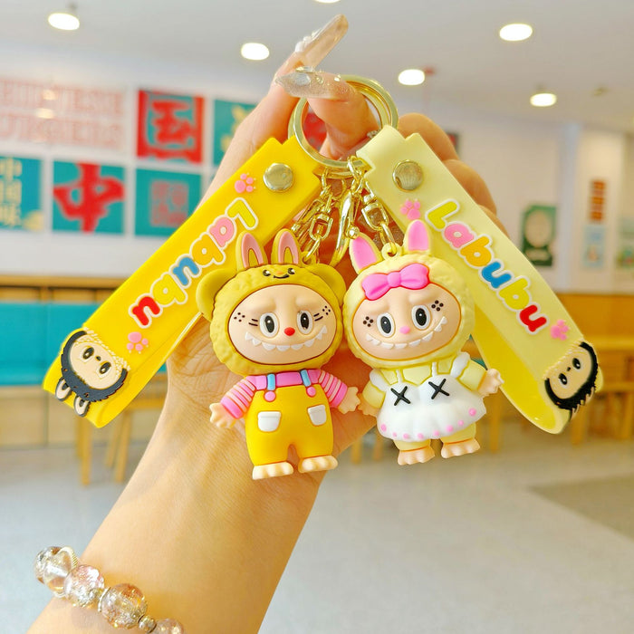 Wholesale New cross-dressing  cartoon keychain cute couple schoolbag pendant car keychain claw machine small gift