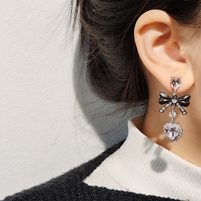 Wholesale Small niche zircon inlaid heart-shaped bow earrings with elegant temperament