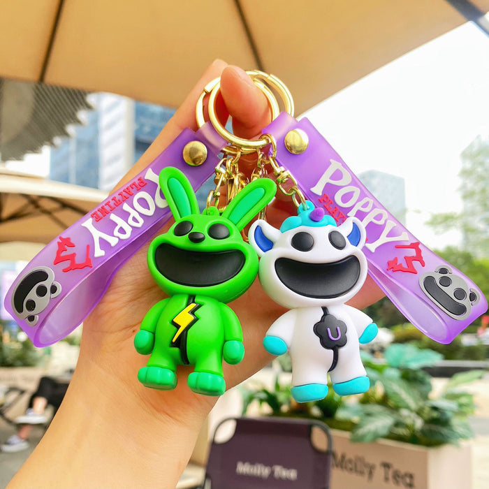 Wholesale Cute silicone smiling animal keychain