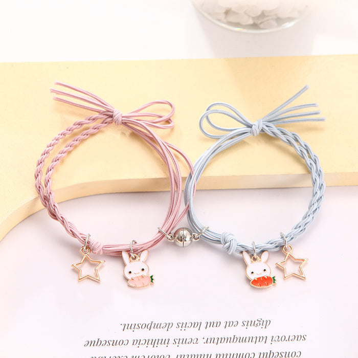 Wholesale Cartoon couple bracelets a pair of small rubber band magnets attract bell bracelet gift