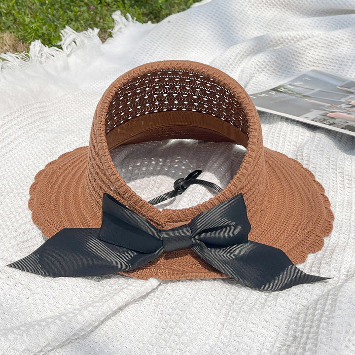 Wholesale New curled edge hollow knitted sun hat temperament bow top hat large brim foldable fisherman hat