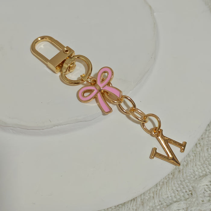 Wholesale Pink bow A-Z keychain alloy accessory