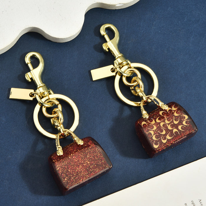 Wholesale Chic Letter C Bag Charm Keychain Red Alloy Electroplated Women S Purse Pendant Gift Resale
