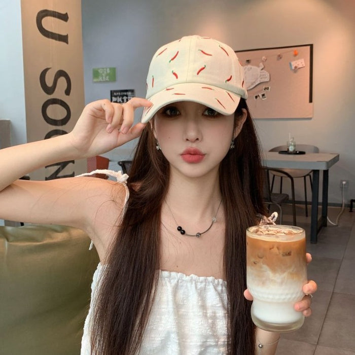 Wholesale Sweet girl style pink baseball cap with playful pepper pattern on the cap, fashionable and eye-catching, versatile style