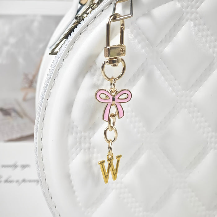 Wholesale Pink bow A-Z keychain alloy accessory