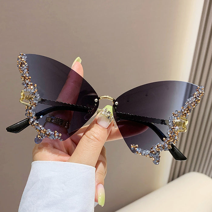 Wholesale New butterfly studded diamond rimless sunglasses with fashionable and exaggerated personality