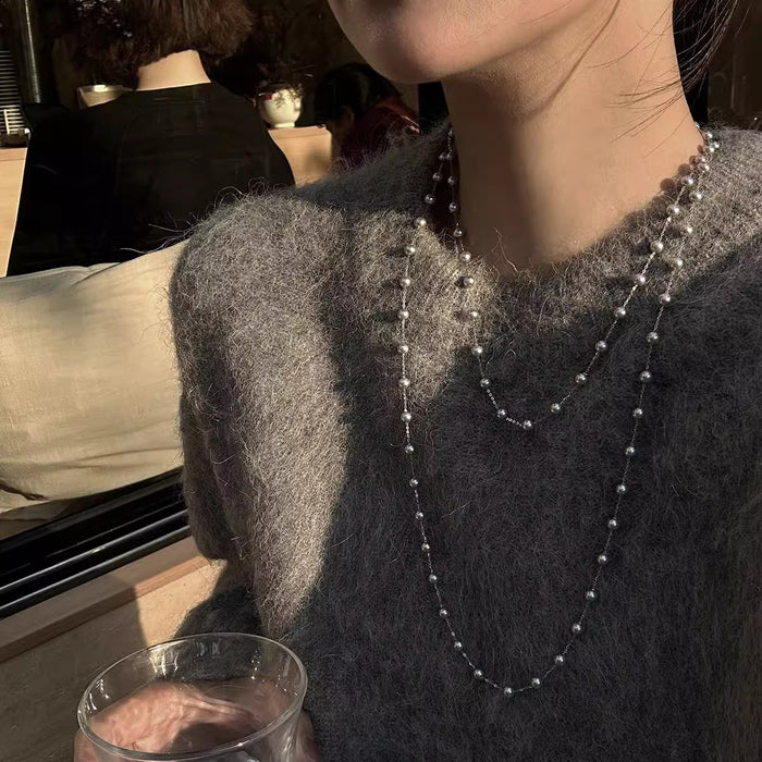 Wholesale Pearl double-layer layered necklace, exquisite and fashionable collarbone chain, elegant and luxurious sweater chain
