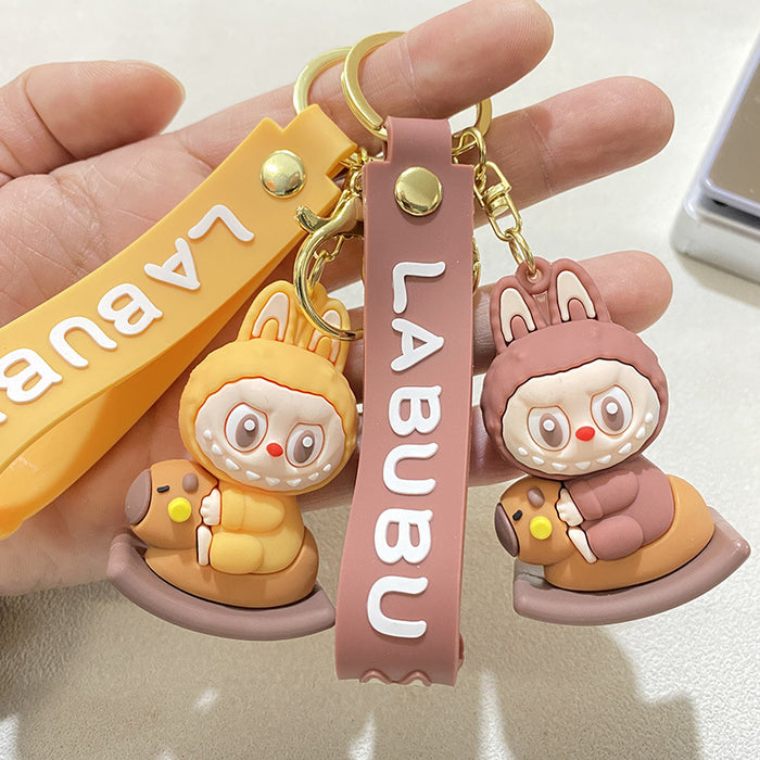 Wholesale Cartoon rocking Trojan horse key chain pendant