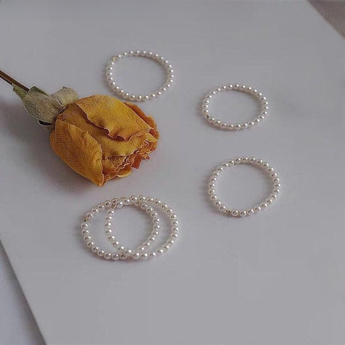Wholesale Pearl ring for women, niche design, fashionable personality, high-end feel, ring with bead beads and plain circles