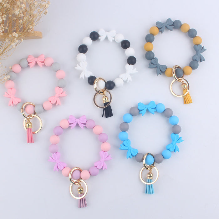 Wholesale Cartoon bow silicone bracelet keychain handmade beaded bracelet jewelry