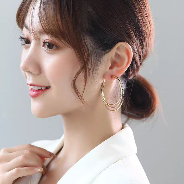 Wholesale Silver needle large ring earrings with multiple layers of large ear rings, exaggerated temperament earrings