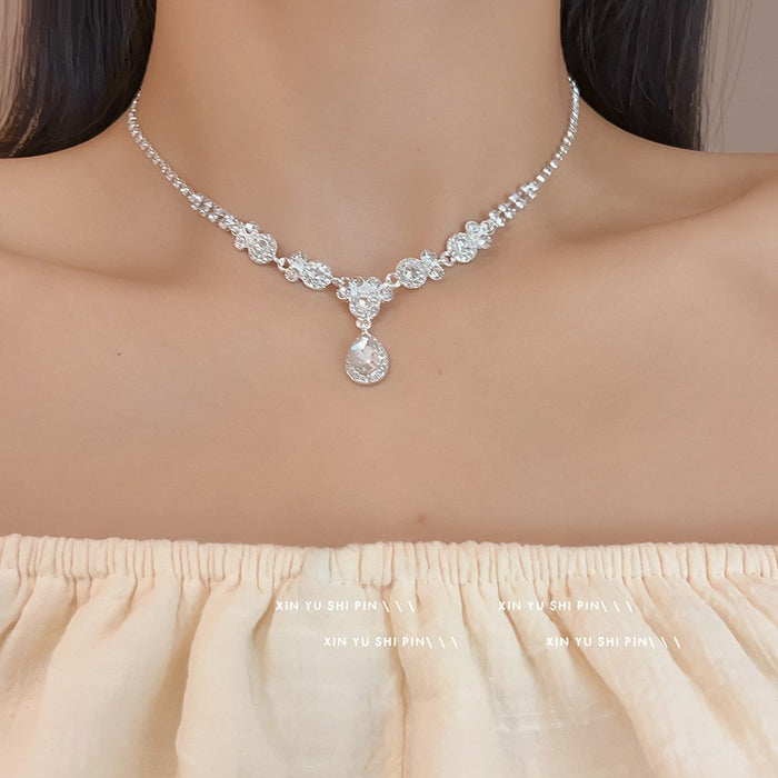 Wholesale Light luxury sparkling diamond water droplet fringe necklace, niche design, high-end temperament, versatile butterfly pendant, collarbone chain