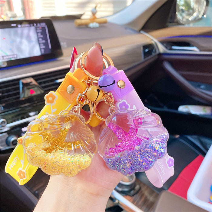 Wholesale Creative starfish floating bottle keychain acrylic oil quicksand car student backpack small gift ornaments