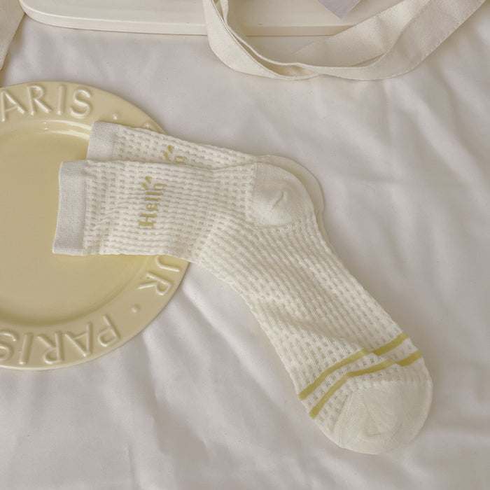 Wholesale Thin sweat absorbing milk white mid tube socks with mesh breathable lace stacking socks