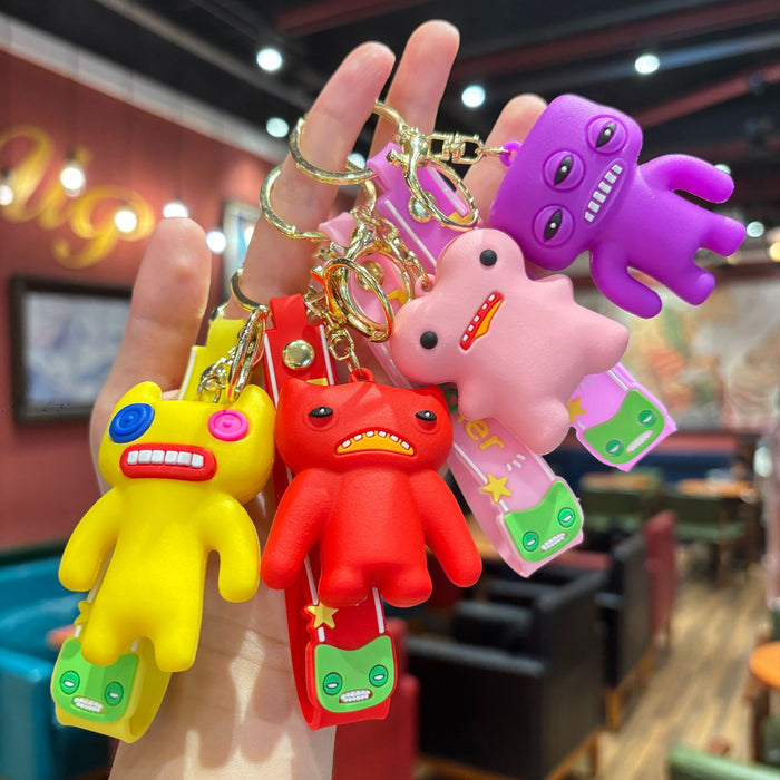 Wholesale Cartoon cute monster series girls cute keychain pendant funny doll keychain student doll small pendant