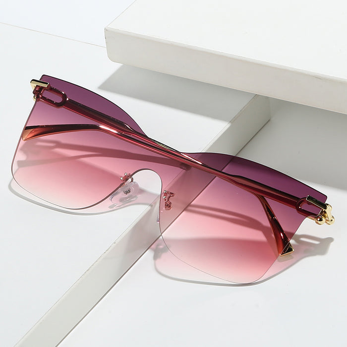 Wholesale Frameless one-piece sunglasses with a high-end feel, personalized trendy glasses, UV resistant cat eye retro sunglasses