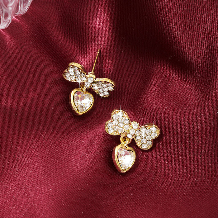 Wholesale Fashionable alloy personalized bow, zircon heart earrings, simple earrings, silver needle earrings