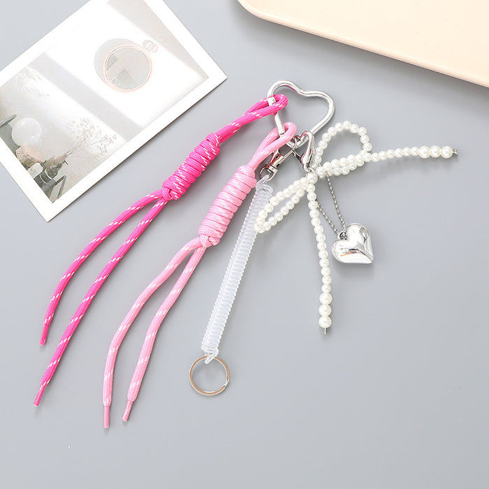 Wholesale Leather bow heart pendant luggage keychain lanyard accessories single buckle tassel pendant accessories