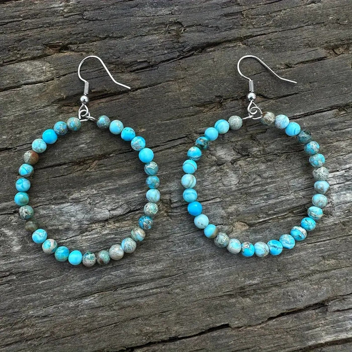 Wholesale Retro fashion hollow round bead earrings with colorful emperor stone beads