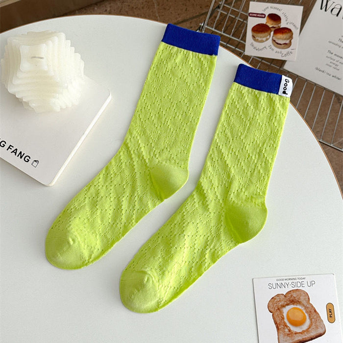 Wholesale Color blocked socks with hollowed out mesh and breathable lettering fabric label, colored midsole socks
