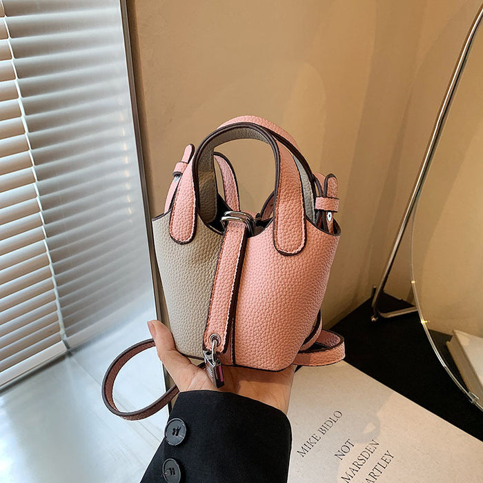 Wholesale Children's bag, high-end color blocked mini bucket bag, hand-held bucket bag, crossbody bag