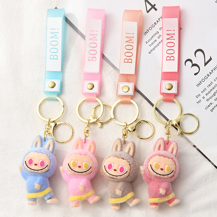 Wholesale Flocking Yoga Little Monster Keychain Small Pendant Cartoon Cute Doll Keychain Small Gift