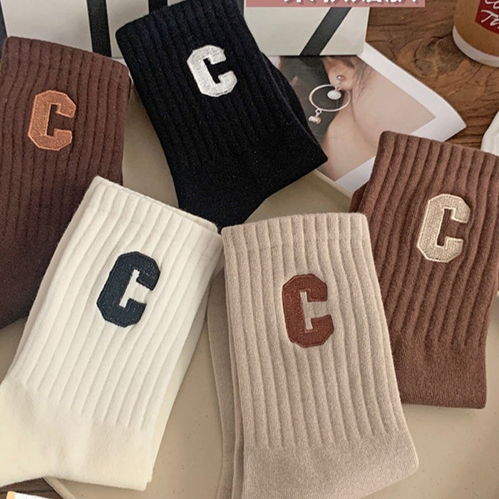Wholesale Letter socks, children's mid tube socks, cotton soles, sweat absorbing and odor proof long socks, external sports socks