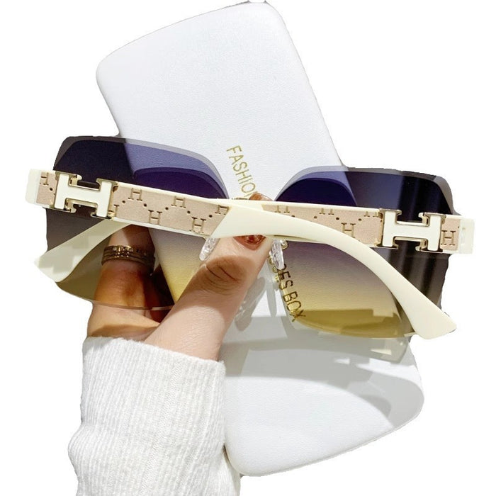 Wholesale Sunglasses with a high-end feel, frameless sunglasses for women, UV resistant driving sun visors