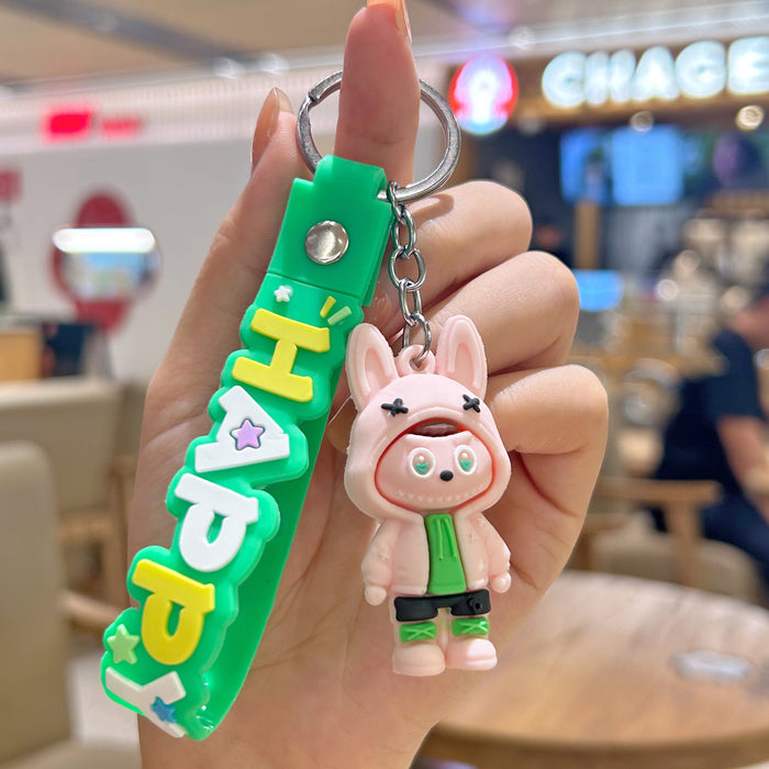 Wholesale Cute cartoon silicone keychain with cute little monster keychain for sweatshirt