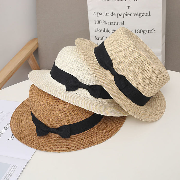 Wholesale New wide eave flat top straw hat for sun protection, vacation bow top hat for versatile sun protection