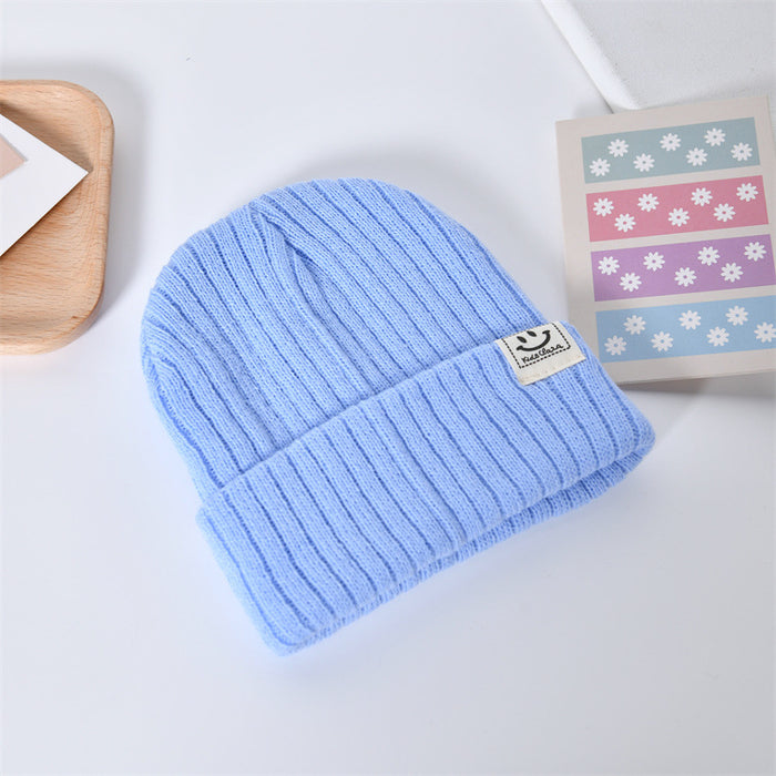 Wholesale Casual, fashionable, warm knit hat, cute smiling face pullover hat