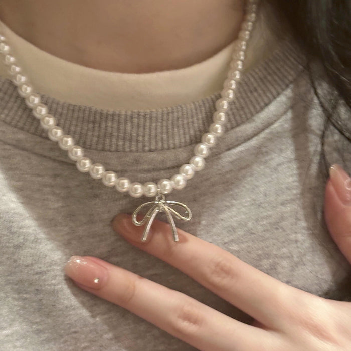 Wholesale Pearl bow pendant necklace, light luxury collarbone chain, niche high-end sense, temperament necklace