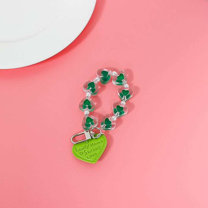 Wholesale fresh simple color love hand chain transparent acrylic chain mobile case accessories