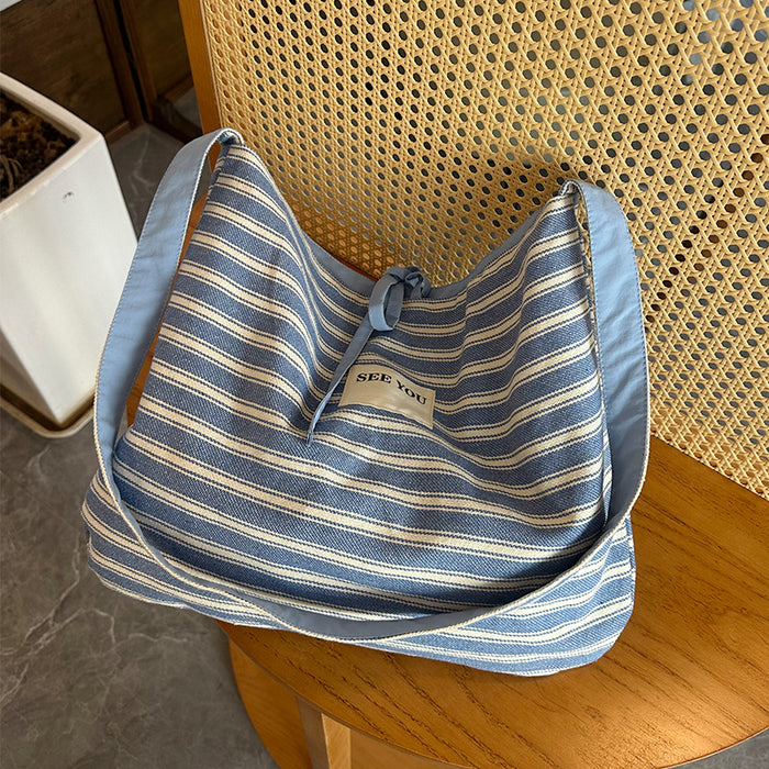 Wholesale Canvas striped large capacity fashionable simple versatile crossbody bag for work commuting tote bag