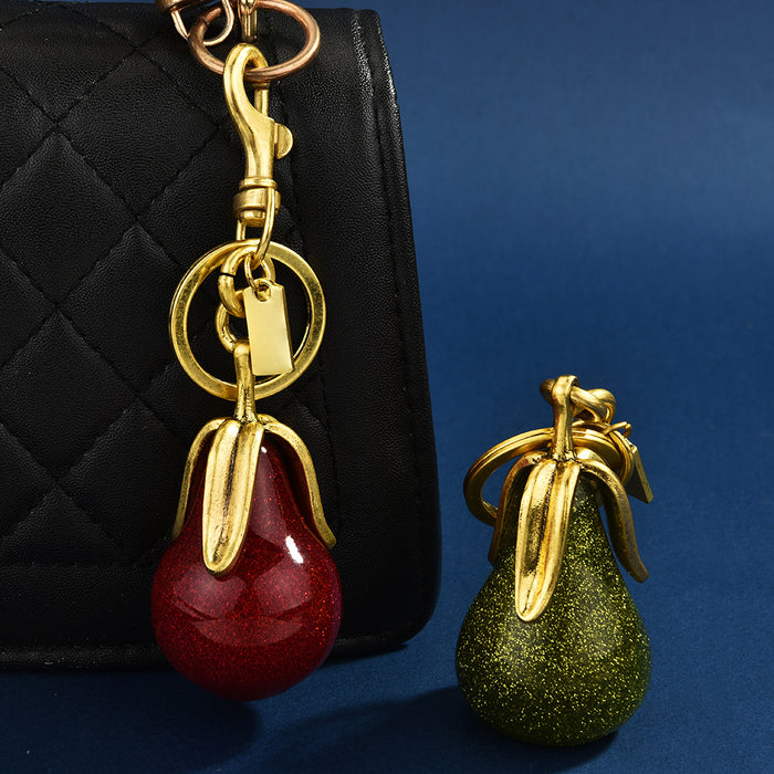 Wholesale Gilded pear-shaped couple keychains symbolizing eternal love