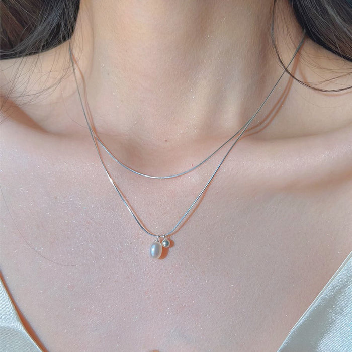 Wholesale Simple double-layer stacked natural pearl necklace, fashionable and personalized collarbone chain, versatile and high-end